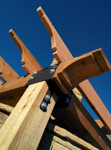 Detail of the posts, beams, and rafters of the outdoor kitchen pergola I helped my friend Jeremy Miller build in Norman. (2015)