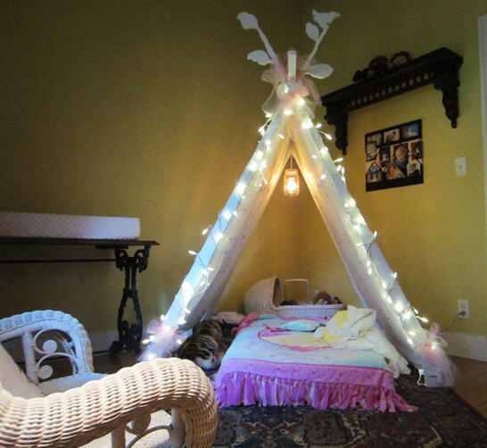 Princess tent-bed I made for my niece when she was a toddler. Knock-down construction, twinkle lights, and fairy mason-jar chandelier. (2016)