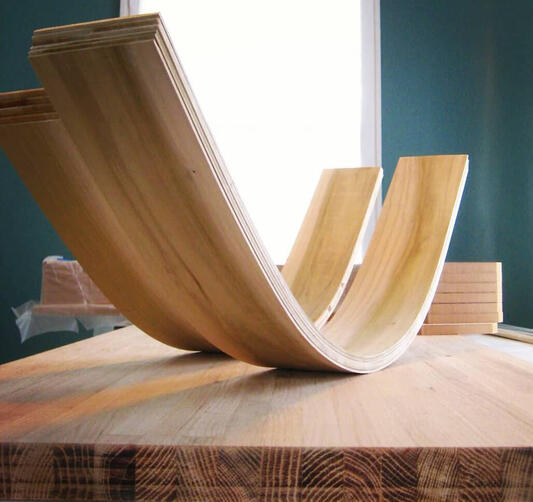 Making bent-lamination baseboards for the rounded corners of my studio apartment. I decided to round the primary corners of the room to lend an Art Deco flair to the space. (2011)