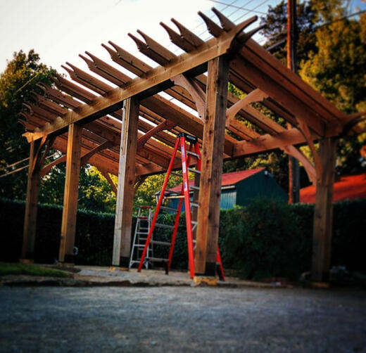 This is the pergola I built for my parents in their back yard. The idea to tilt the roof, align the rafters in pairs, and create a radiused leading edge was all sort of made up as I went. (2015)